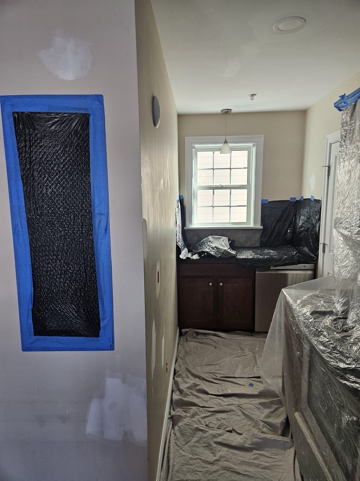 Lead-safe paint prep work in an older New Hampshire home