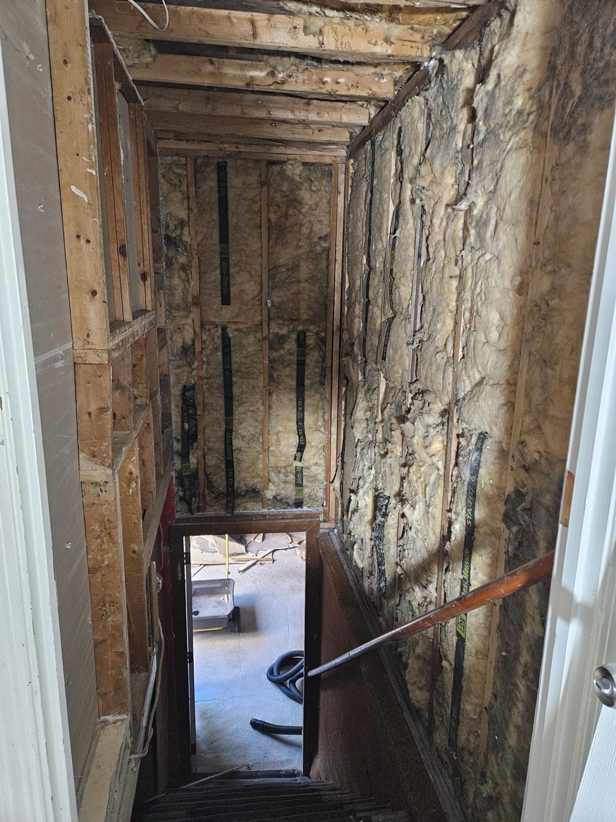 Interior staircase before refinishing