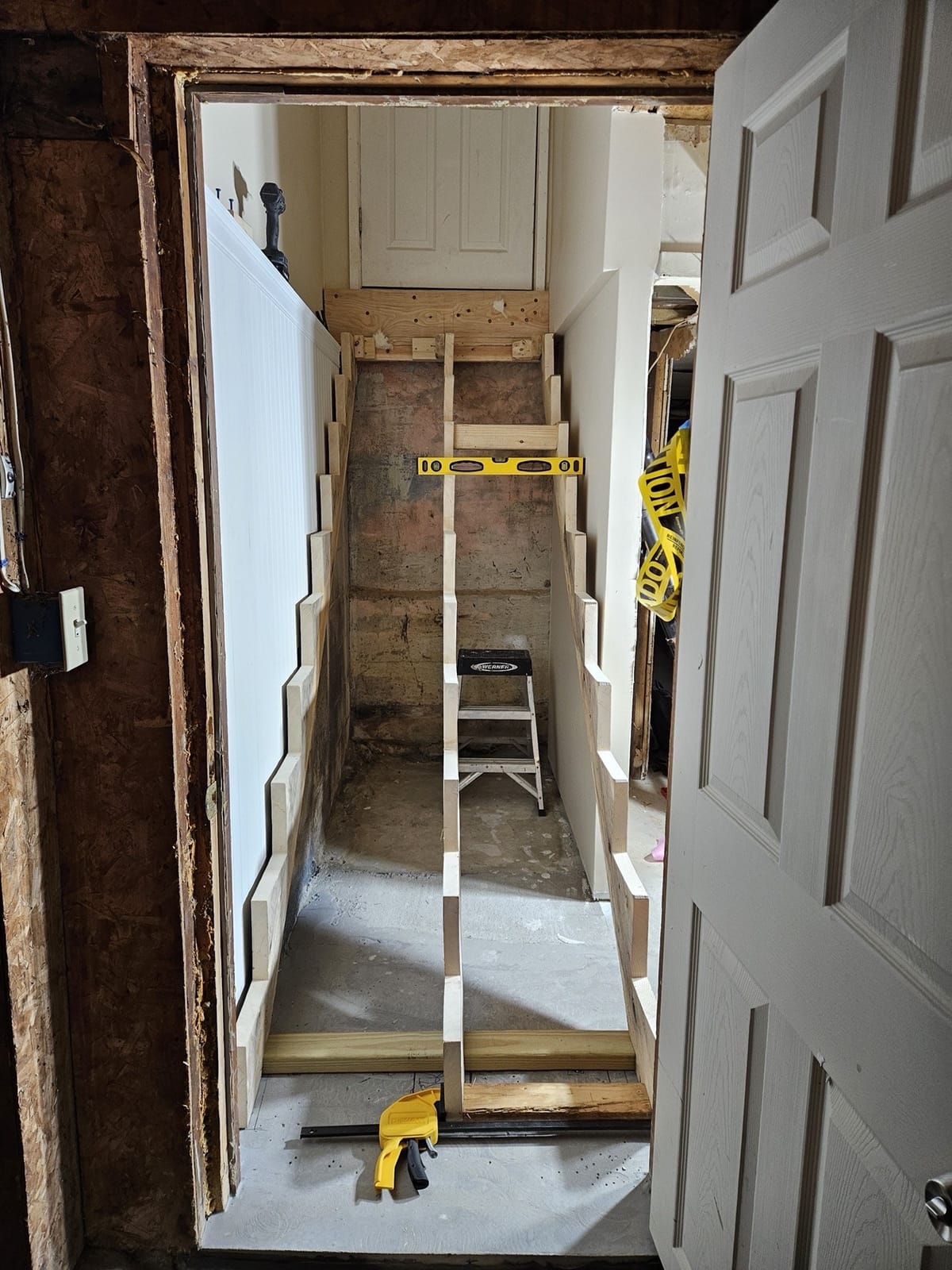 Staircase refinishing mid-project, sanded and ready for stain