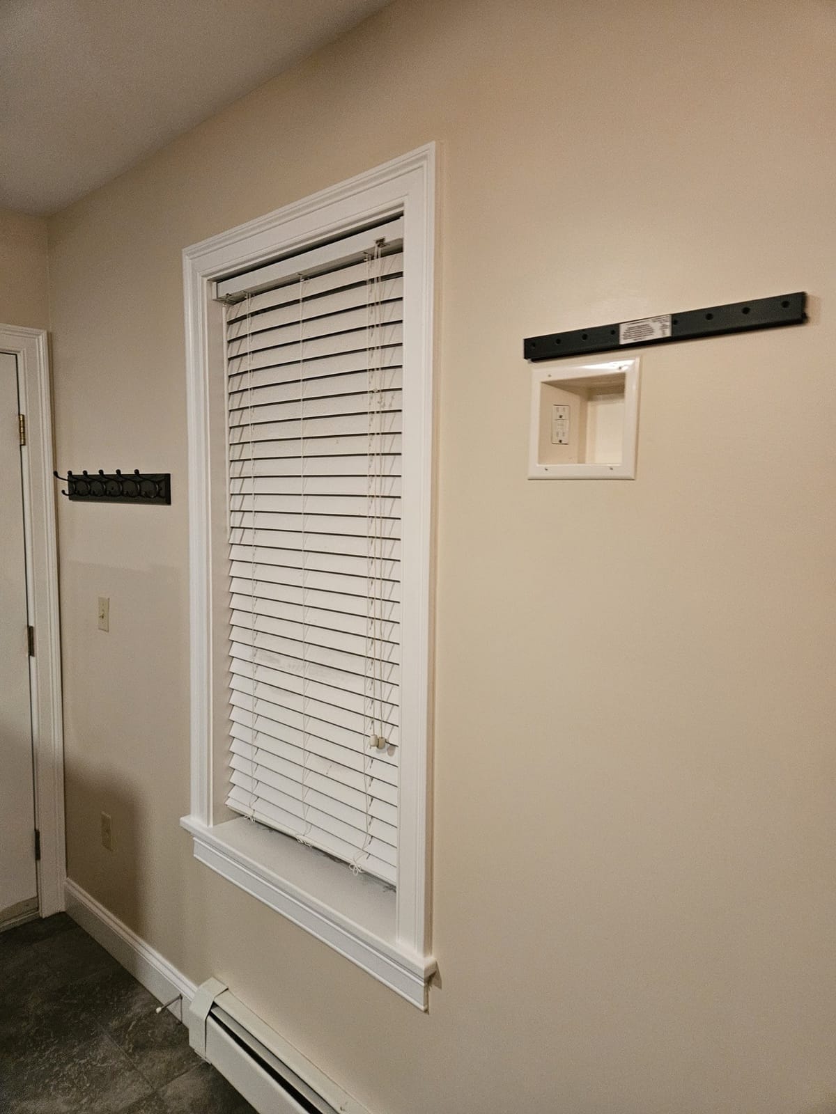 Wall-mounted TV installation in a Manchester NH home